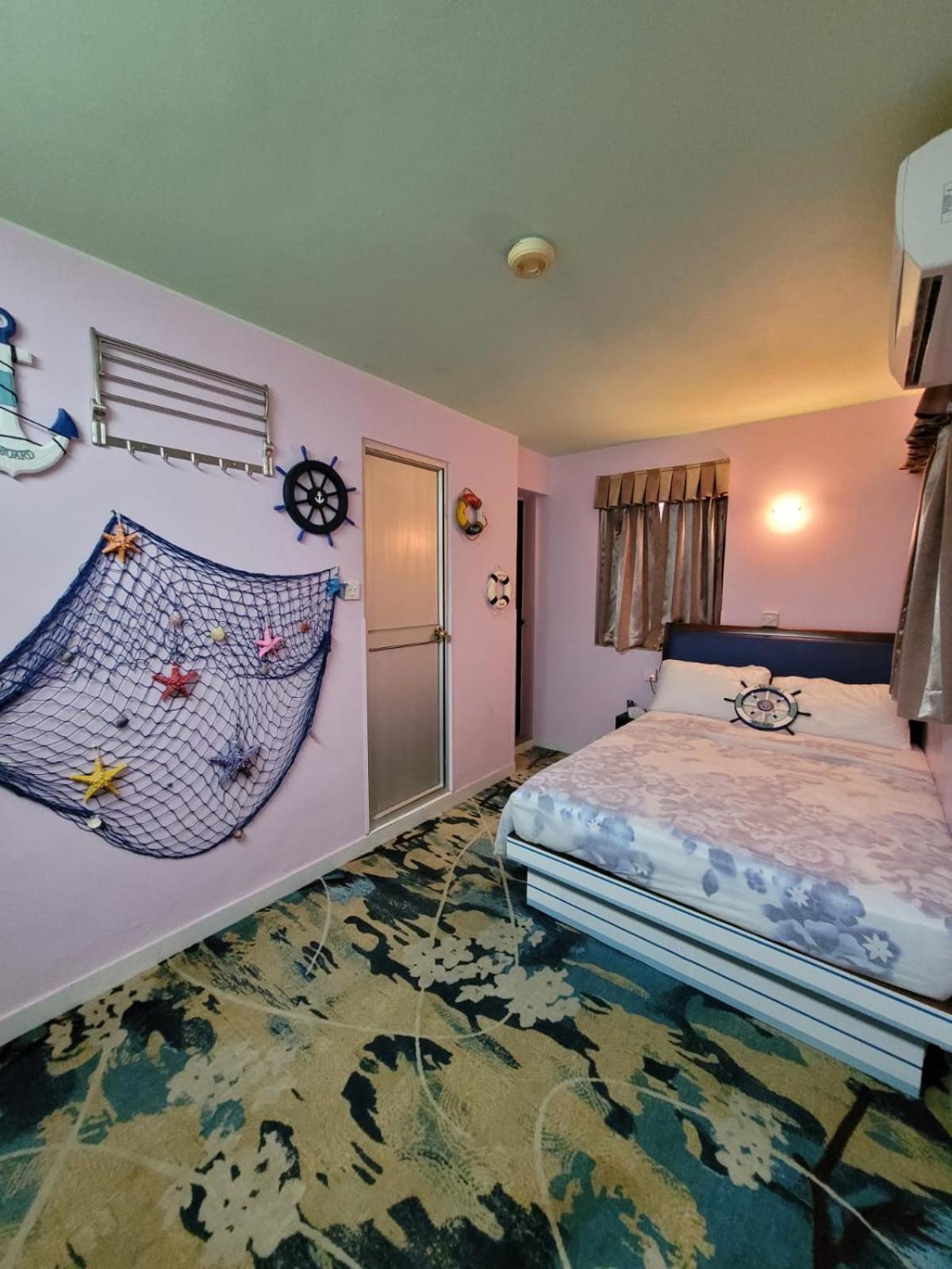Man Lai Wah Ferienhaus *